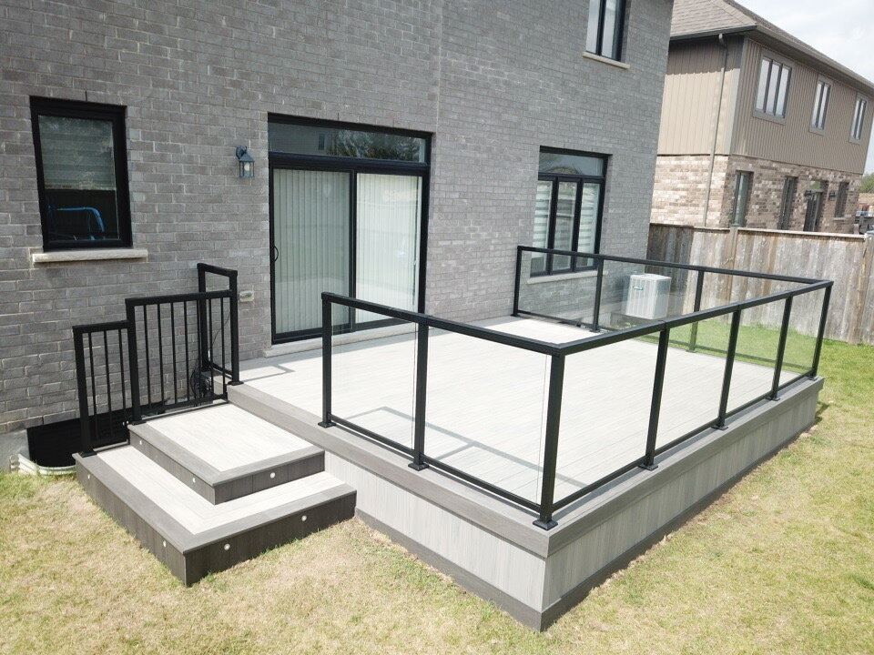 Completed backyard deck and outdoor living space by Creative Custom Decks